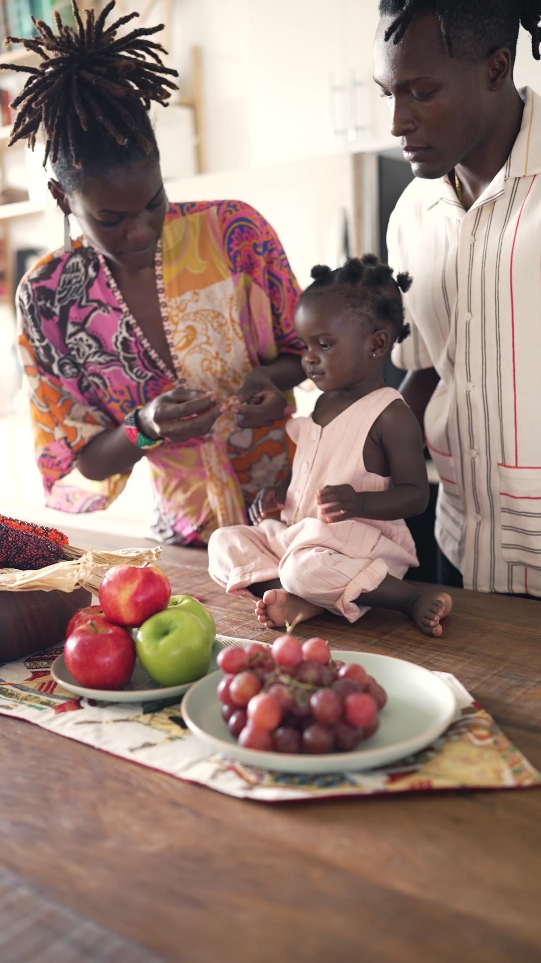 A family sharing a meal together around a table